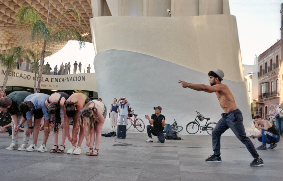 Street performers beneath the Metropol Parasol, Seville Street performers beneath the Metropol Parasol, Seville
