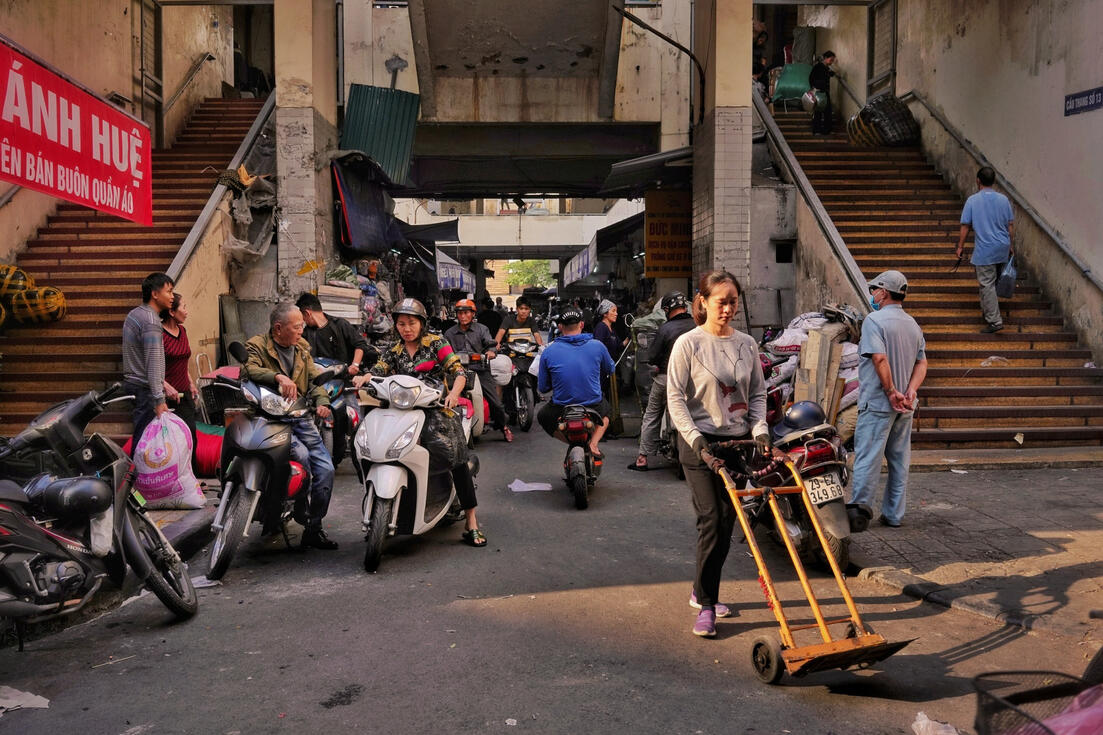 Porter with a hand truck at Dong Xuan market's loading bay, Hanoi Porter with a hand truck at Dong Xuan market's loading bay, Hanoi